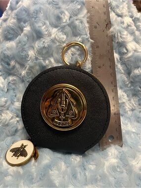 Black Round Coin Pouch with Gold Medallion